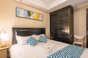 Chengdu Yunxi Luxury High-end Suite Apartment Hotel房間的床