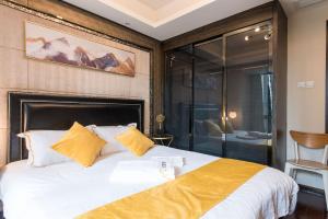 Chengdu Yunxi Luxury High-end Suite Apartment Hotel房間的床