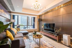 Chengdu Yunxi Luxury High-end Suite Apartment Hotel電視和／或娛樂中心