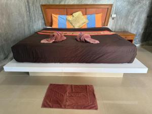 Postel nebo postele na pokoji v ubytování Lanta natural hut garden + 36 fotografií