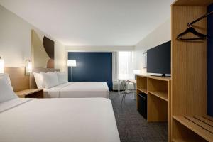 Spark By Hilton Nashville At Opryland客房内的一张或多张床位