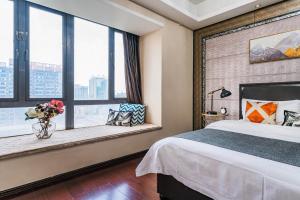 Chengdu Yunxi Luxury High-end Suite Apartment Hotel房間的床