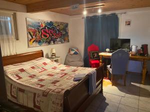 Μια τηλεόραση ή/και κέντρο ψυχαγωγίας στο Bienvenue chez les Anges