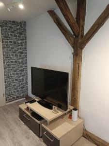 TV a/nebo společenská místnost v ubytování Ferienwohnung + 3 fotografie