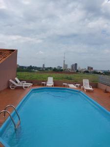 Swimmingpoolen hos eller tæt på apartamento confortável aconchegante