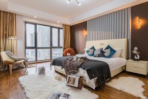 Chengdu Yunxi Luxury High-end Suite Apartment Hotel房間的床