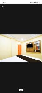 Kuchyň nebo kuchyňský kout v ubytování Hotel Sai Vinayaka