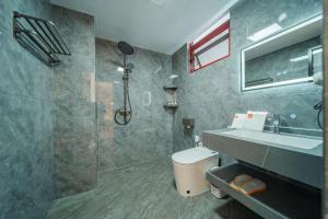 Koupelna v ubytování Jianshui Yunshui Inn + 31 fotografií