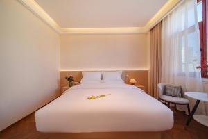 Jianshui Yunshui Inn客房内的一张或多张床位