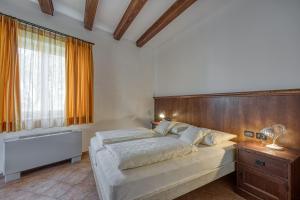 Postel nebo postele na pokoji v ubytování Villa Marittima + 63 fotografií