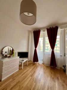 TV a/nebo společenská místnost v ubytování Solely elegante Trilocale vicino Firenze