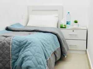 Postel nebo postele na pokoji v ubytování Prestige Pearl Abu Dhabi