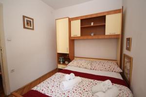 Posteľ alebo postele v izbe v ubytovaní Apartment Adriatica City
