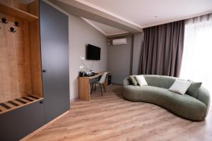 TV a/nebo společenská místnost v ubytování Astana Palace