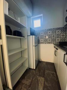 Kuchyň nebo kuchyňský kout v ubytování Garda Apartman