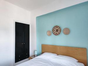 Postel nebo postele na pokoji v ubytování Boho Sea View Apartment