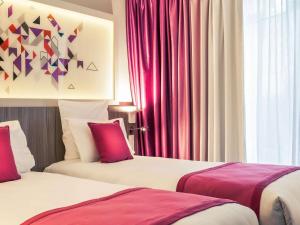 Katil atau katil-katil dalam bilik di Mercure Toulouse Sud