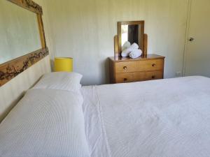 Postel nebo postele na pokoji v ubytování Tullah HideAway