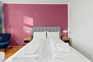 Giường trong phòng chung tại Cozy Living Apartment "Amadeus" - free parking
