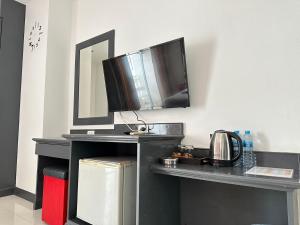 Kuchyň nebo kuchyňský kout v ubytování Hotel Baya Phuket