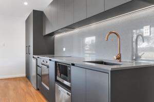 a kitchen with a sink and a counter top at Warrawindi Escapes in Penola +13 photos