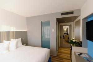 טלויזיה ו/או מרכז בידור ב-Colmar Hotel