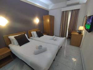 The Windsor Hotel客房内的一张或多张床位