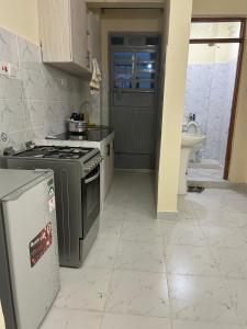 Kuchyň nebo kuchyňský kout v ubytování Bobs place