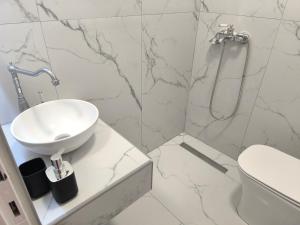 Kúpeľňa v ubytovaní Vetti Rooms