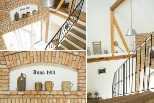 a renovation of a house with a brick fireplace and stairs at Ferienhaus Scheune in Reichenwalde