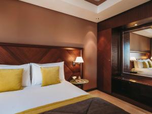 Ένα ή περισσότερα κρεβάτια σε δωμάτιο στο Le Diwan Hotel Rabat - MGallery Collection