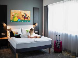 Posteľ alebo postele v izbe v ubytovaní ibis styles Grudziadz