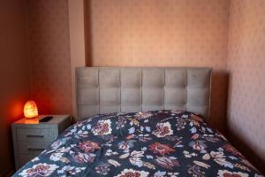 Vuode tai vuoteita majoituspaikassa Apartmani Dambo
