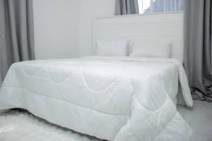 Ένα ή περισσότερα κρεβάτια σε δωμάτιο στο Yeta apartments +3 φωτογραφίες