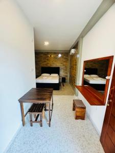 Postel nebo postele na pokoji v ubytování Resolve Garden Hotel