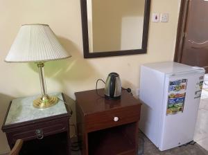 Η κουζίνα ή μικρή κουζίνα στο Saba Furnished Apartments