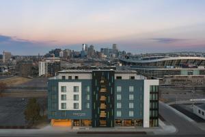 a view of a building with a city in the background at Courtyard by Marriott Denver Downtown West in Denver