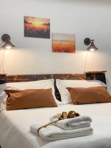 Postel nebo postele na pokoji v ubytování Big Fish Alghero Guesthouse