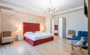 Postel nebo postele na pokoji v ubytování Rivendell Boutique Hotel Tbilisi City