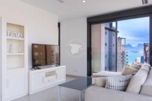 Televízia a/alebo spoločenská miestnosť v ubytovaní CostaBlancaDreams Calpe Beach II 7R in Calpe