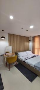 En eller flere senge i et værelse på Condo Unit at One Pontefino Tower Unit 706