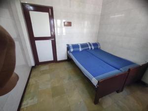 Postel nebo postele na pokoji v ubytování G R MANSION