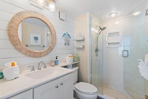 a bathroom with a sink and a shower at Magnolia House 504 At Destin Pointe Resort in Destin +31 photos