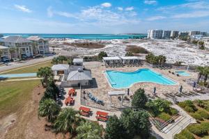 an aerial view of a pool at a resort at Magnolia House 504 At Destin Pointe Resort in Destin