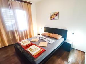 Posteľ alebo postele v izbe v ubytovaní Mila Pet friendly holiday house with private place on the beach + 37 fotografií
