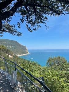 a view of the ocean from a hill at L'angolo di mare [Centro di Sirolo] in Sirolo