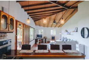 a living room with a couch and a table at Casa Marea in Cambutal