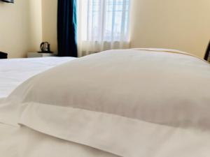 Voodi või voodid majutusasutuse SD Hotel toas