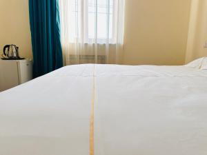 Voodi või voodid majutusasutuse SD Hotel toas