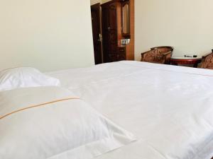 Voodi või voodid majutusasutuse SD Hotel toas